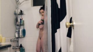 Tessa Fowler takes a shower