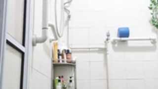 Aunty bathing caught in spy camera