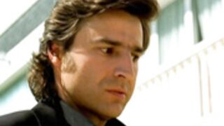 Manuela Arcuri topless sunbathing