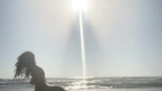 Nina Romane naked beach yoga