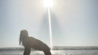 Nina Romane naked beach yoga