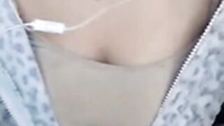 Little teen shows her boobs