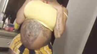 Pregnant CreamyExotica shows off ass and tits