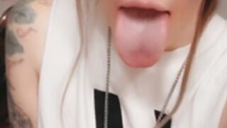 EVXIE MXY OF SHOWS HER TONGUE UVULA AND MOUTH