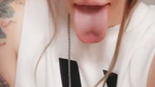 EVXIE MXY OF SHOWS HER TONGUE UVULA AND MOUTH