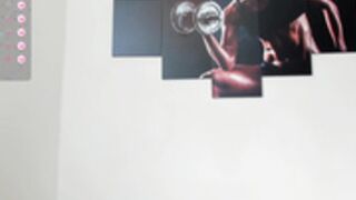 very muscular girl flexing