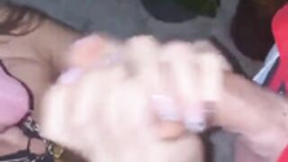 Slut sucks two dicks in public