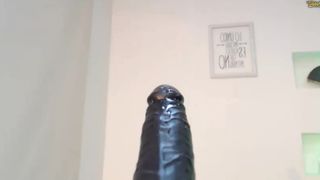 Evagomez - Sucking a Big Black Dildo