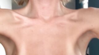 Yourina clenching big tits