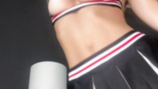 Schoolgirl/cheerleader outfit tease