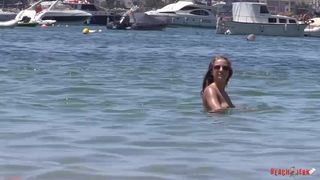 Beach babes with sunglasss enjoy the day