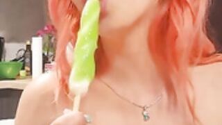 Sexy red head and a popsicle