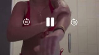 ximenasaenz oiling her body in bikini