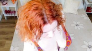 Foxy Sophie casually on her bed