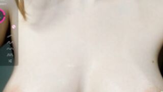 brittcubitt applying ice cubes to her tits