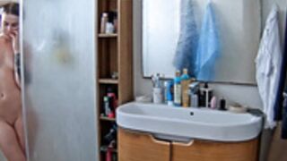 Selene is taking a shower, body is perfect