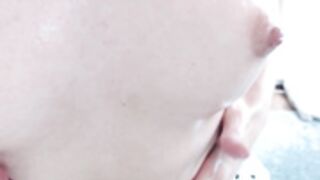 cleolane rubs lotion on breasts