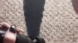 Emo girl rides a massive dragon toy