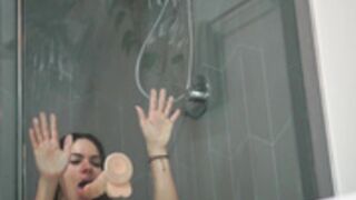 Aspen enjoys a dildo in the shower