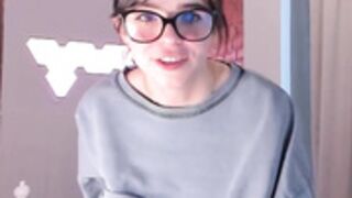 cute bottomless girl with glasses fingering herself