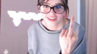 cute bottomless girl with glasses fingering herself