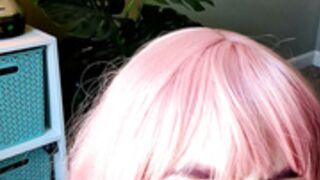 Pink hair Howard sucking on dildo