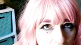 Pink hair Howard sucking on dildo