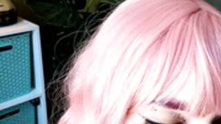 Pink hair Howard sucking on dildo