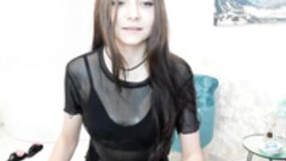 Jenderik having a shower, fully clothed