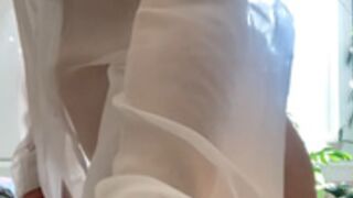 Brigitte Goudz, sheer white dress shirt strip tease 1