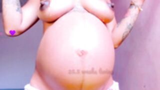 Big belly preggo Latina with nice thick nipples
