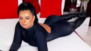 Cassyecross in spandex bodysuit with boots