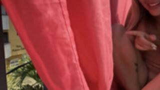 Dianita_1988 squirts on people from her balcony part 2