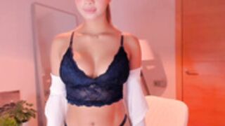 AdaraCruz striping boob show