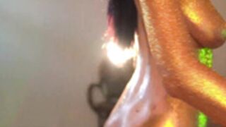 sophia_lean dancing covered in gold dust