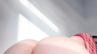 Auhneesh Nicole - red fishnet dress