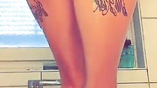 Busty tattooed Bimbo