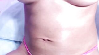 Bloated bitch with abs pushes out her belly