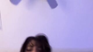 pouty selenaa whole fist in her mouth