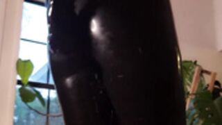 riding dildo in latex catsuit