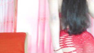 Latina dancing and biceps flex