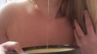 Whitney Wisconsin pees in bowl