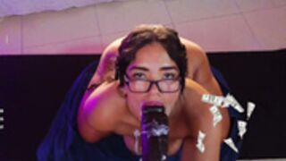 laady_brownn on her knees sucking black dildo