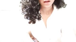 Simone Miller in a public bathroom