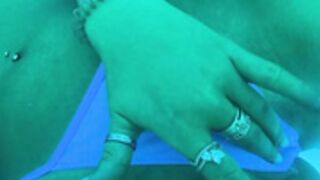 Han Louise playing on sunbed