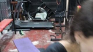 Fitness Latina flexing biceps and armpits sweaty