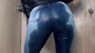 Wet leather and jeans peeing