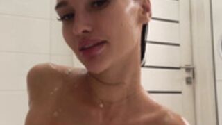 Alina is taking a bath