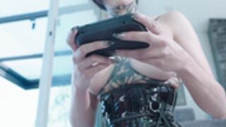 goth_dolll poses in her leather corset tits out