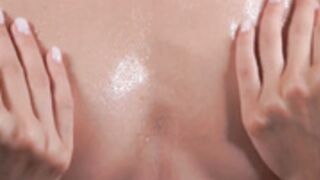 Enjoy cam model Edita's sexy oiled shiny tits
